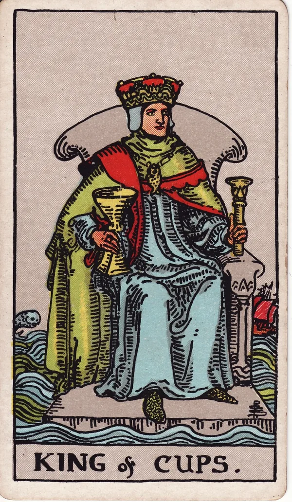 King of Cups tarot card from the classic deck, illustrated by Pamela Colman Smith in 1909