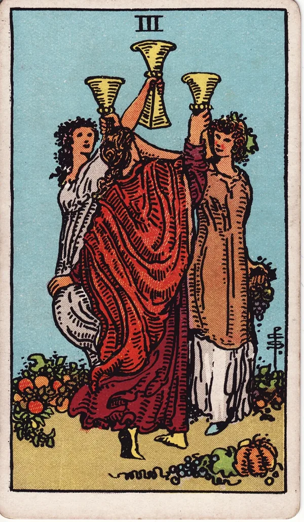 Three of Cups tarot card from the classic deck, illustrated by Pamela Colman Smith in 1909