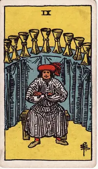 Nine of Cups tarot card from the classic deck, illustrated by Pamela Colman Smith in 1909