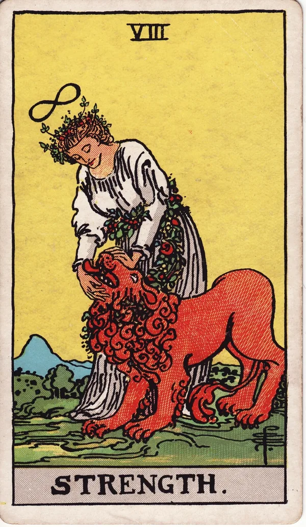 Strength tarot card from the classic deck, illustrated by Pamela Colman Smith in 1909