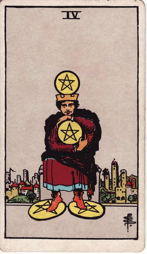 Four of Pentacles tarot card from the classic deck, illustrated by Pamela Colman Smith in 1909