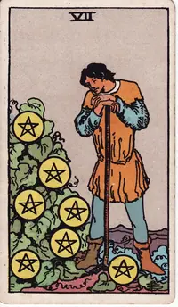 Seven of Pentacles tarot card from the classic deck, illustrated by Pamela Colman Smith in 1909