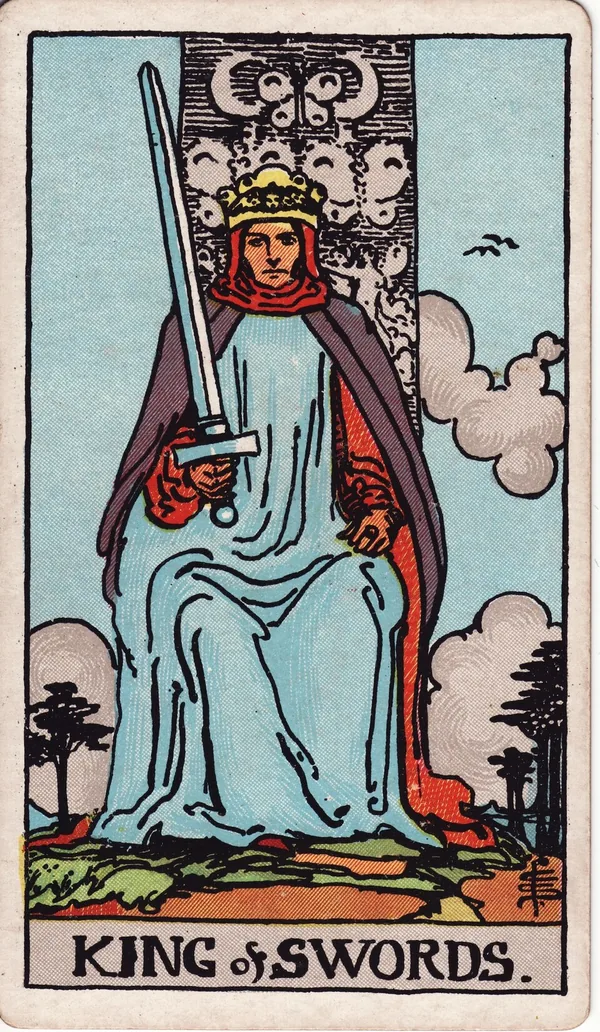 King of Swords tarot card from the classic deck, illustrated by Pamela Colman Smith in 1909