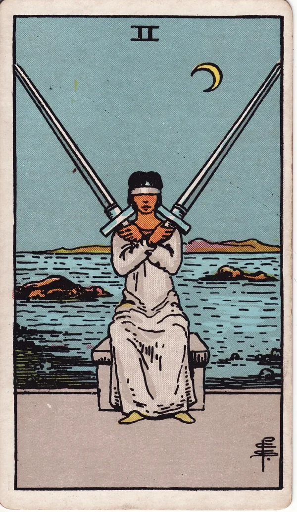 Two of Swords tarot card from the classic deck, illustrated by Pamela Colman Smith in 1909