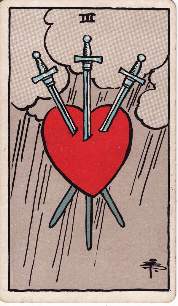Three of Swords tarot card from the classic deck, illustrated by Pamela Colman Smith in 1909