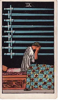 Nine of Swords tarot card from the classic deck, illustrated by Pamela Colman Smith in 1909