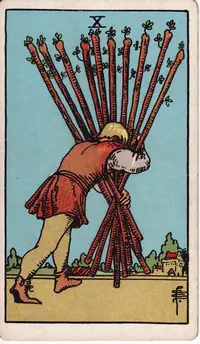Ten of Wands tarot card from the classic deck, illustrated by Pamela Colman Smith in 1909