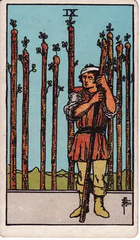 Nine of Wands tarot card from the classic deck, illustrated by Pamela Colman Smith in 1909